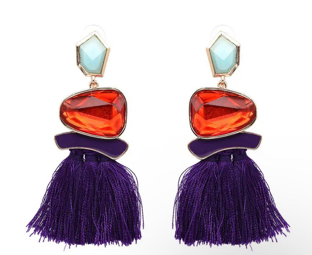 Pendientes statement con borla violeta