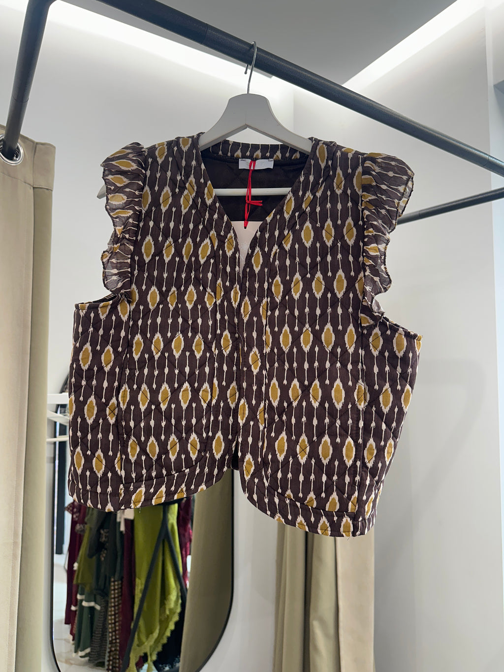 Chaleco acolchado con volante | Luxala Shop